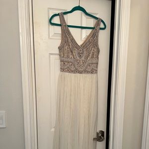 BHLDN cream bridesmaid dress. Size 8. Worn once, good condition.
